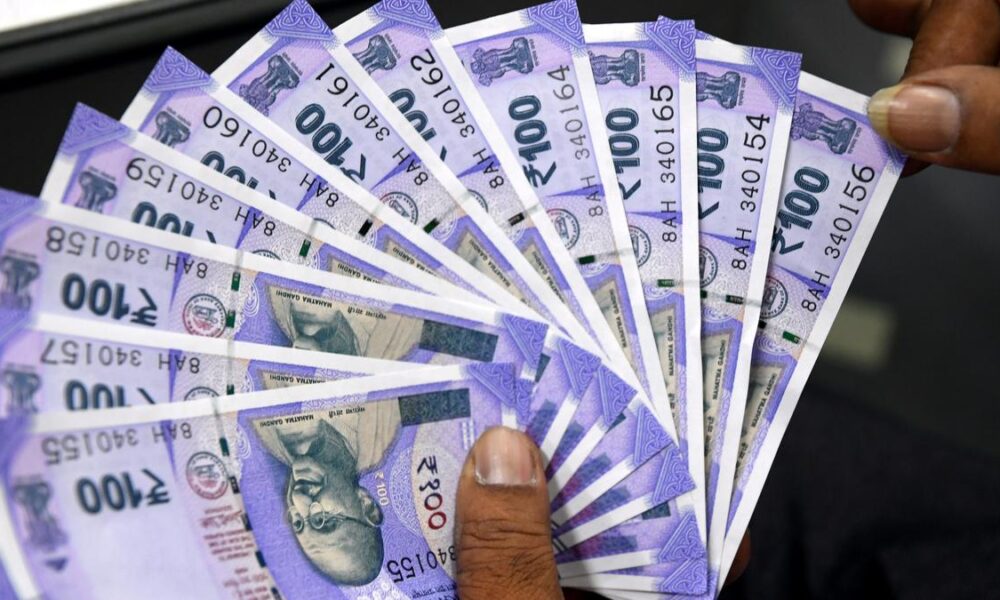 Rupee jumps 36 paise to close at 86 against U.S. dollar