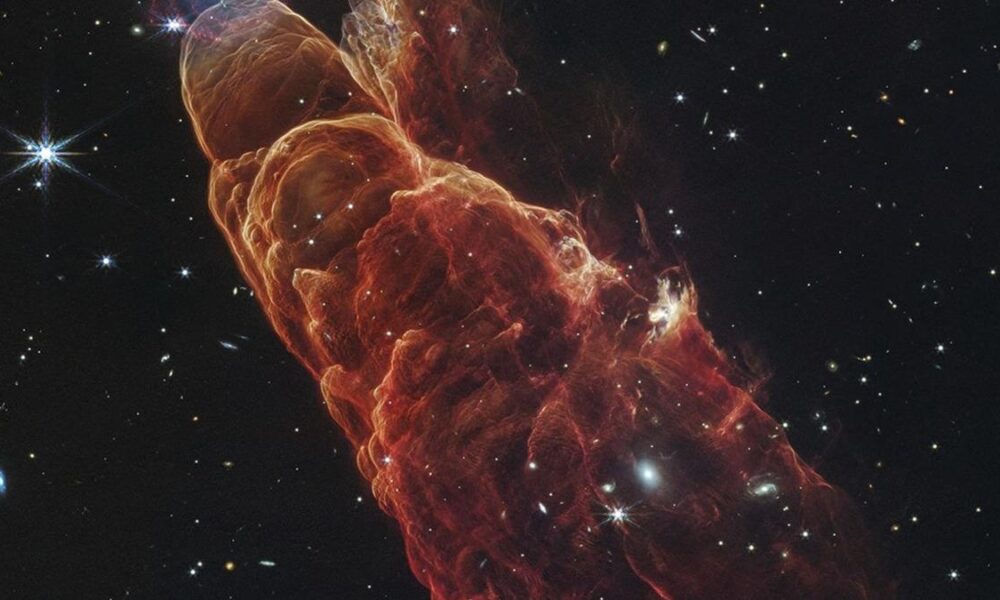 Webb Space Telescope captures a star in the making and a galaxy far, far away