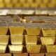 Gold futures decline on weak global cues