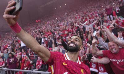 Party time at Anfield as Liverpool wins Premier League for record-equaling 20th top-flight title