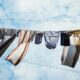 Why do clothes look dark when immersed in water?