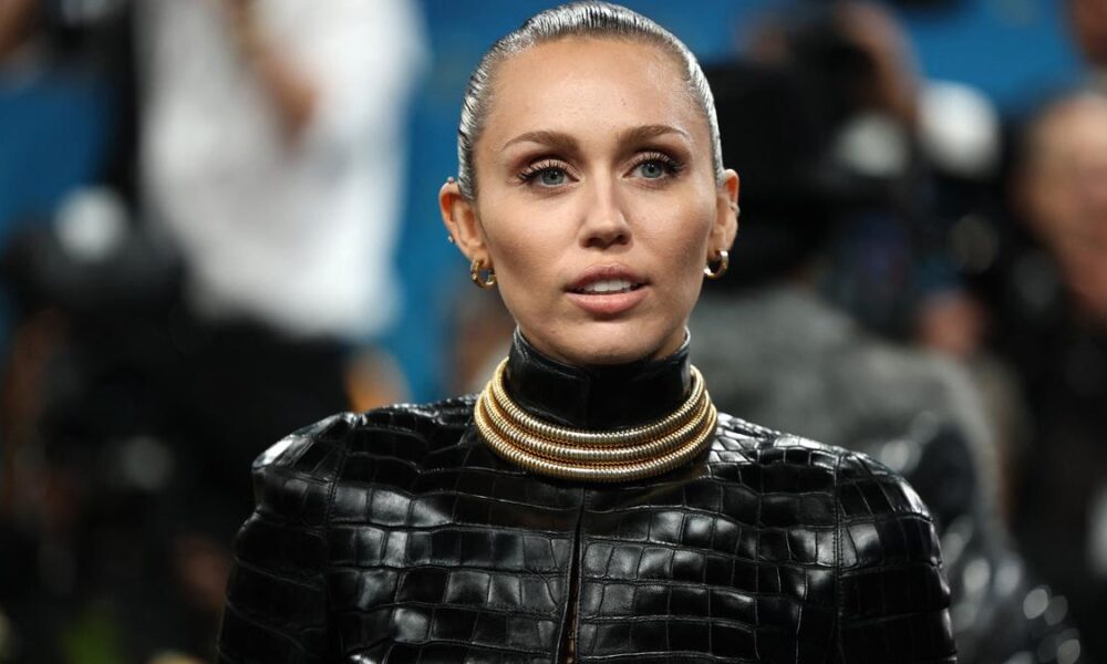 Miley Cyrus reveals she caught ‘brutal infection’ on kneecap after shooting ‘Something Beautiful’ on Hollywood Walk of Fame