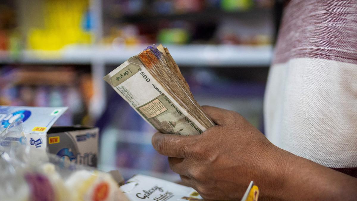 Rupee falls 21 paise to close at 85.63 against U.S. dollar
