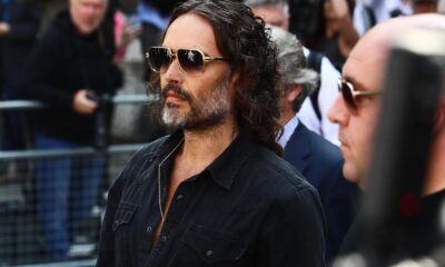 Russell Brand granted conditional bail after appearing in London court on rape and assault charges