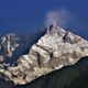 Using cold atoms in space to weigh the Himalayas