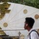Rupee trades in narrow range against U.S. dollar in early trade