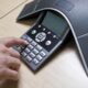 How does a telephone intercom function in an office setting?