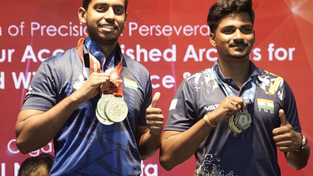 SAI felicitates medal-winning archers Jadhav and Bhardwaj