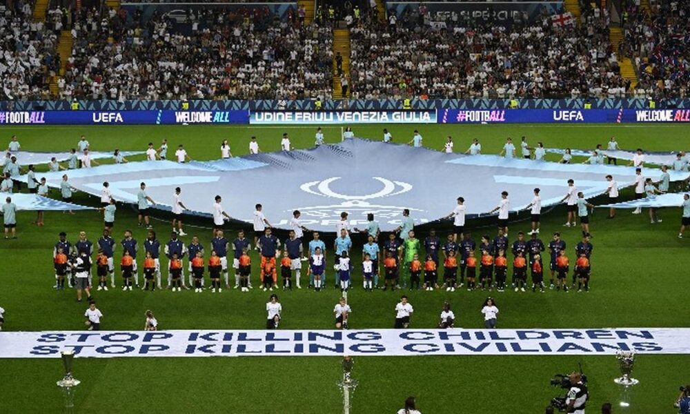 UEFA rolls out banner in support of children in war zones ahead of Super Cup