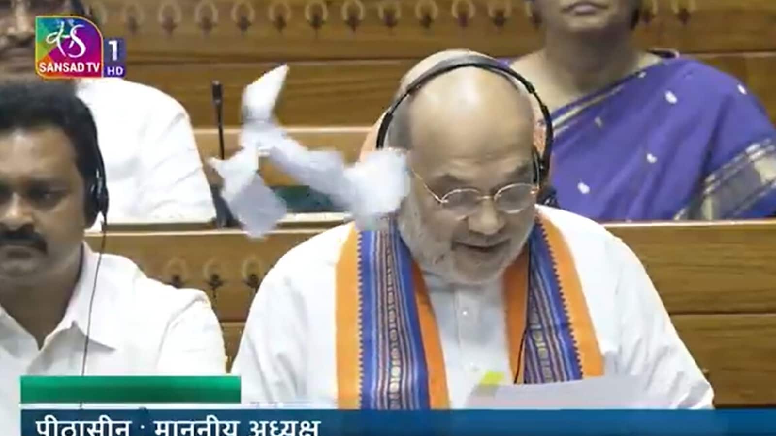 Video: Opposition tears copies of 3 Constitutional Bills, throws them at Amit Shah | Mint
