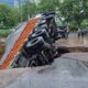 Why do sinkholes form in urban areas?