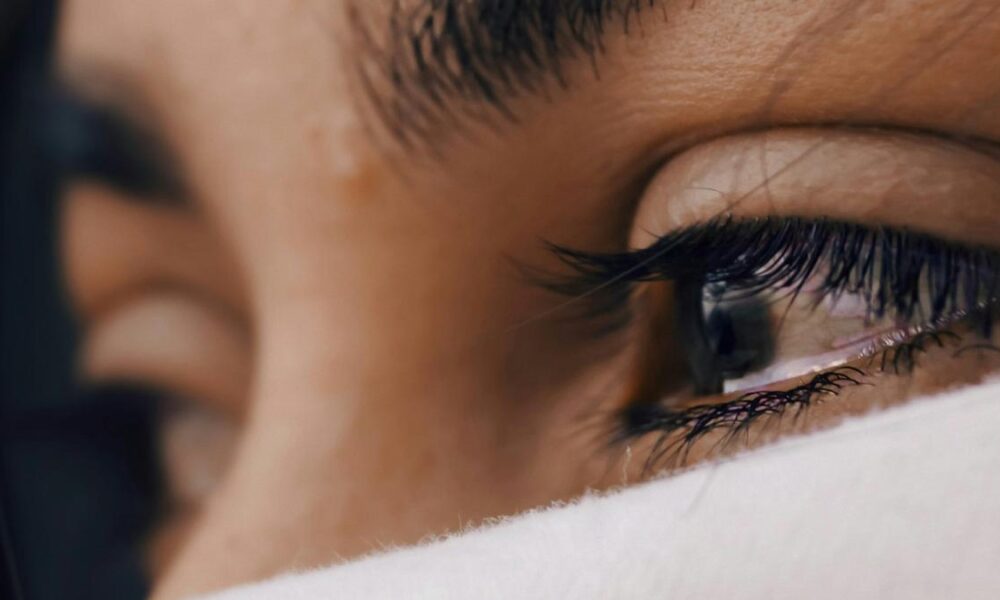 Why does sadness cause us to shed tears?