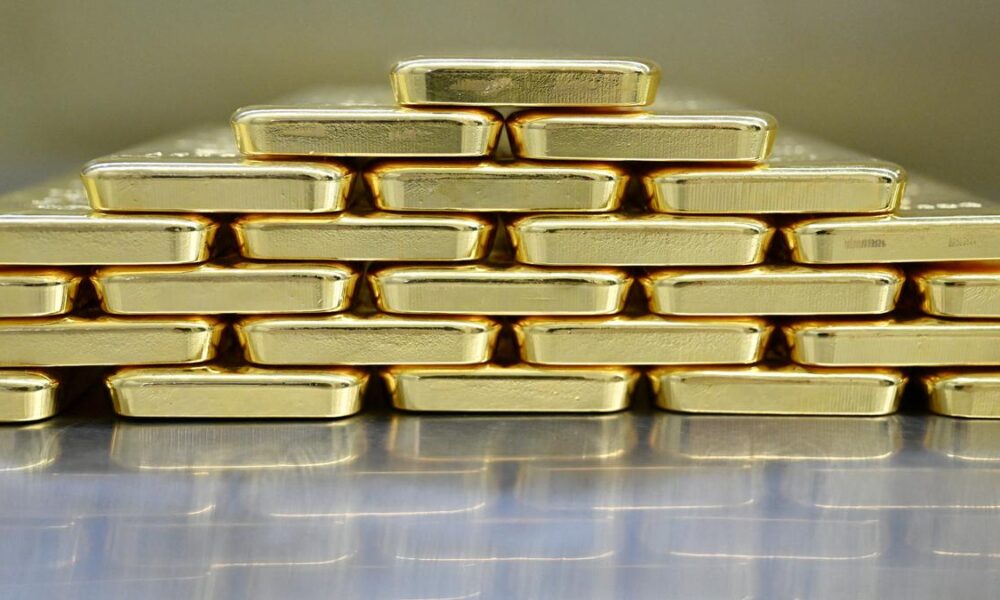 Gold declines from record high on profit booking, U.S. government shutdown worries