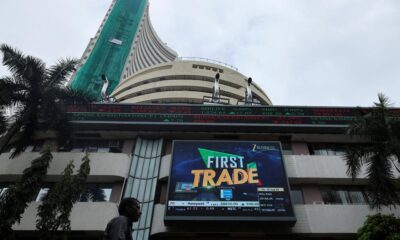Sensex, Nifty settle with modest gains amid see-saw trade