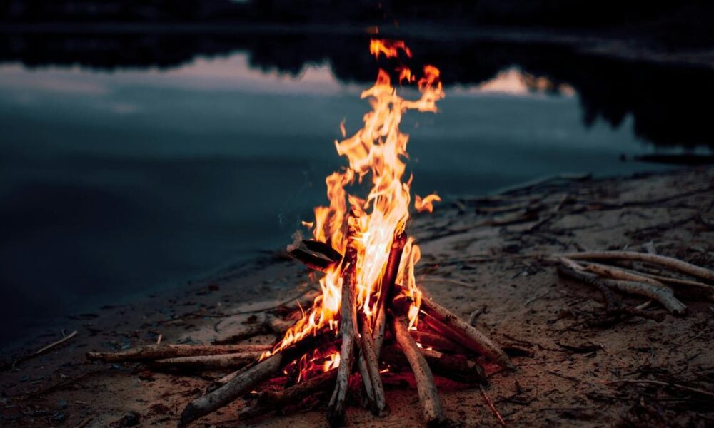 Why does smoke from a stove or hearth irritate the eyes?