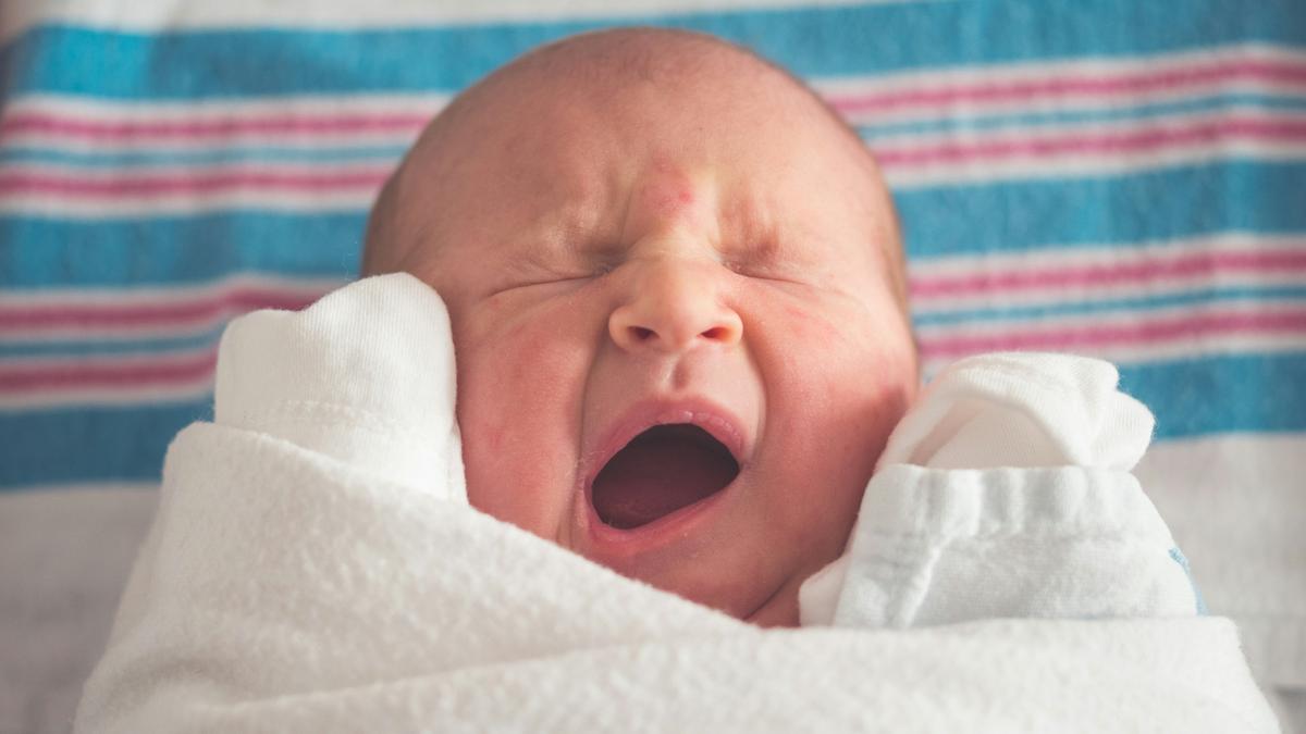 Why does yawning cause watery eyes?