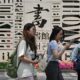 Overseas scholars drawn to China's scientific clout, funding