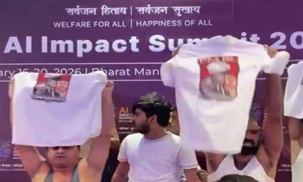 AI Summit disrupted as Indian Youth Congress workers stage topless protest, chant anti-Modi slogans | Watch Video | Mint