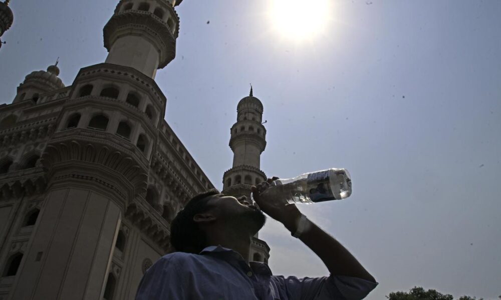 On hotter days, why does the sky seem more grey than blue?